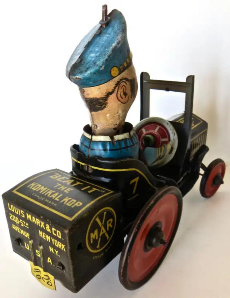 Louis Marx and Company "Komikal Kop" Tin WindUp Toy by Louis Marx Co