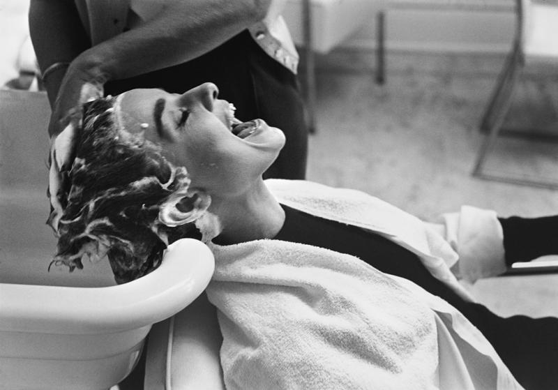 Mark Shaw Mark Shaw AUDREY HEPBURN GETTING SHAMPOOED AND LAUGHING 1953