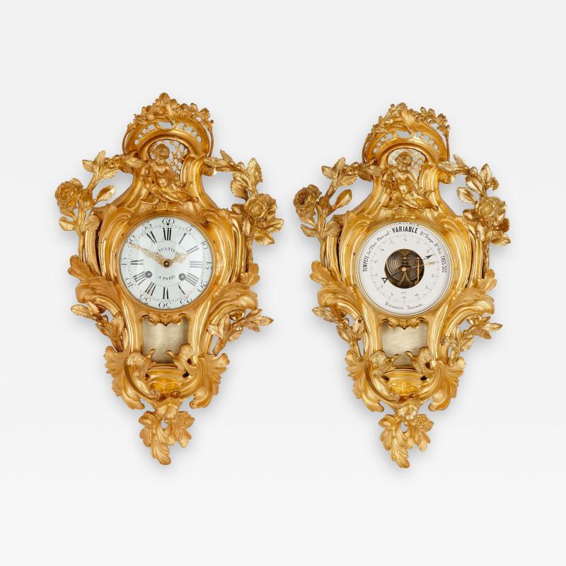 Rococo style gilt bronze cartel clock and barometer