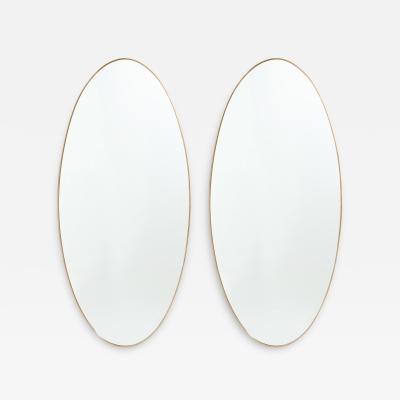 1950s Italian Rare Pair of Grand Scale Oval Brass Mirrors