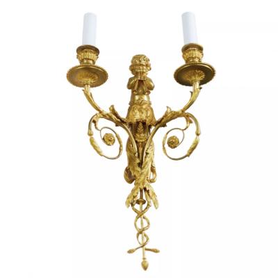 A Pair Of French Gilt Bronze Two Light Wall Appliques In The Louis XVI Style 