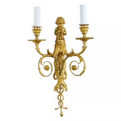 A Pair Of French Gilt Bronze Two Light Wall Appliques In The Louis XVI Style 