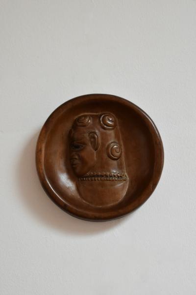 Africanist low relief round wooden wall sculpture 1970s 