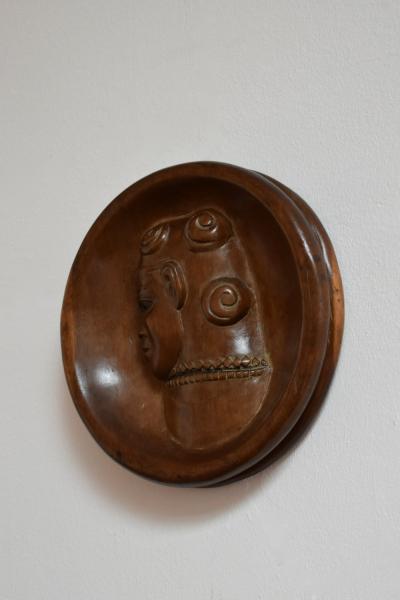 Africanist low relief round wooden wall sculpture 1970s 