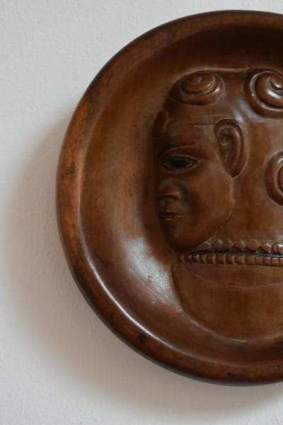 Africanist low relief round wooden wall sculpture 1970s 