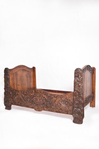 Carved walnut bed end of 19th century 