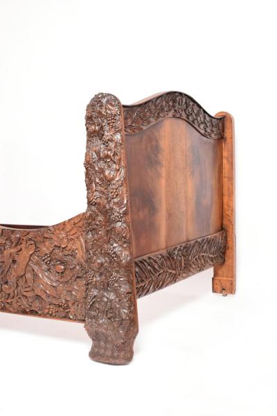 Carved walnut bed end of 19th century 