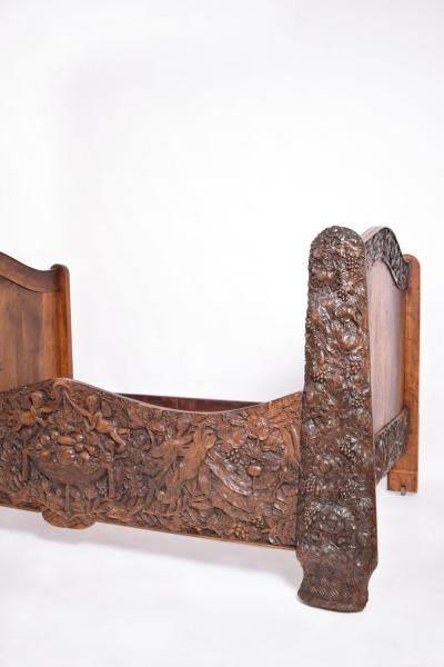 Carved walnut bed end of 19th century 
