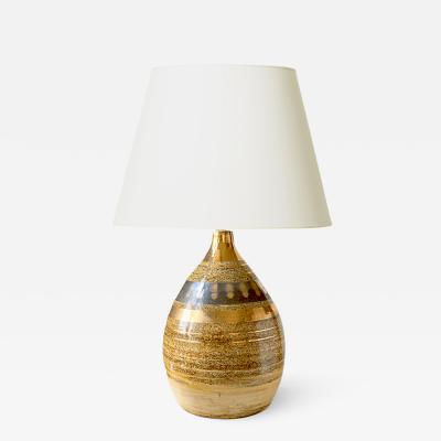 Georges Pelletier Table lamp with sandy glazing and gilded stripes by Georges Pelletier