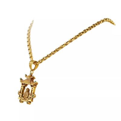 Gold Necklace With A Pagoda Pendant Featuring A Meditating Buddha 