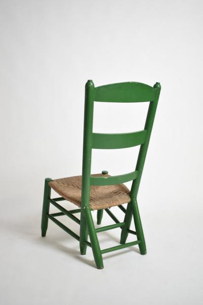 Green painted wood and straw fireside chair 1960s 