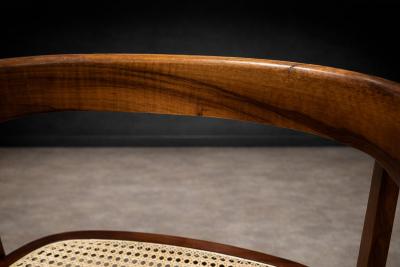 Joaquim Tenreiro Pair of Armchairs in Rosewood and Cane Joaquim Tenreiro 1950s Lot 533