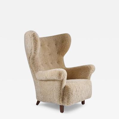 Large Danish Midcentury Lounge Chair in Sheepskin 1940s
