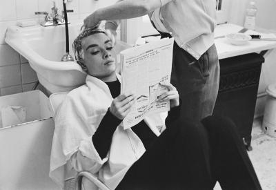 Mark Shaw Mark Shaw AUDREY HEPBURN GETTING SHAMPOOED AND READING 1953