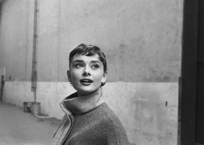 Mark Shaw Mark Shaw AUDREY HEPBURN IN GREY TURTLENECK SWEATER LOOKING UP 1953