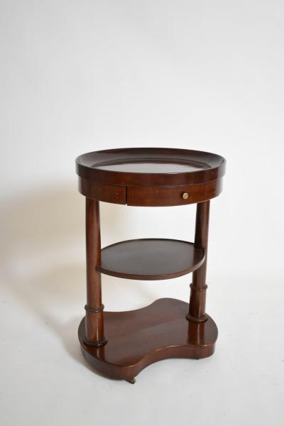 Pair of mahogany kidney ovale flying tables XIXth c 