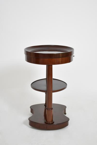Pair of mahogany kidney ovale flying tables XIXth c 