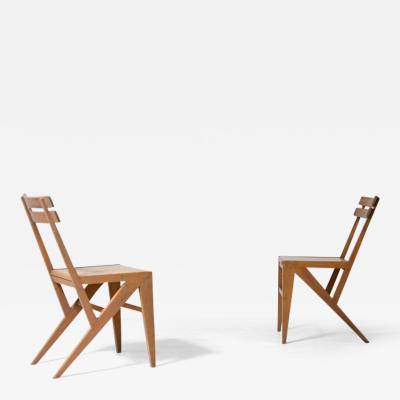 Pair of modernist wooden chairs 