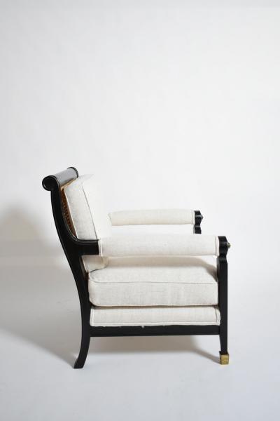Pair of neoclassical ebonised wood and caning armchairs 1960s 