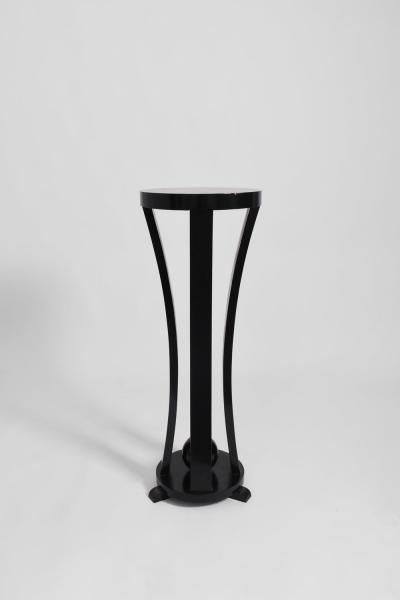 Pair of round black lacquered wooden pedestal tables 1960s 