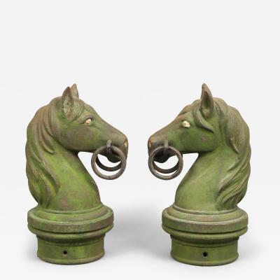 RARE PAIR OF CAST IRON HORSE HEAD HITCHING POSTS