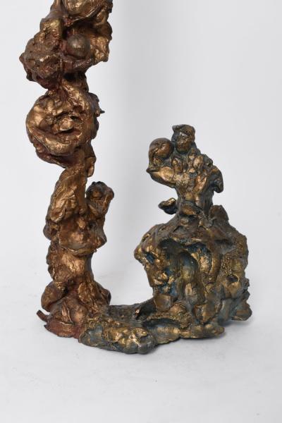 Sculpture in gold bronze suggesting a group of female figures France 20th c 