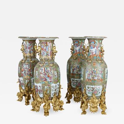 Set of four large gilt bronze mounted Chinese porcelain vases