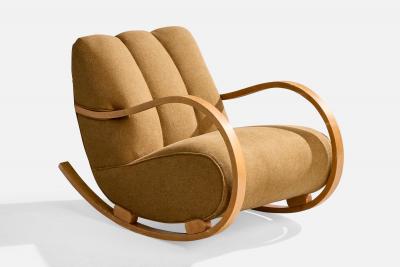 Swedish Designer Rocking Chair with Wood and Fabric Sweden 1940s