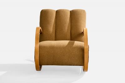 Swedish Designer Rocking Chair with Wood and Fabric Sweden 1940s