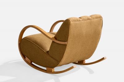 Swedish Designer Rocking Chair with Wood and Fabric Sweden 1940s