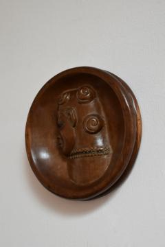 Africanist low relief round wooden wall sculpture 1970s  - 4539341