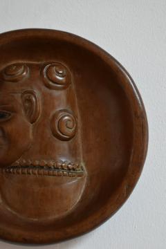 Africanist low relief round wooden wall sculpture 1970s  - 4539345