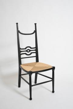 Arts Crafts ebonised wood fireside chair 1900s  - 4539574