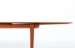 Johannes Andersen Danish Modern Expanding Teak Draw Leaf Dining Table - 2931844