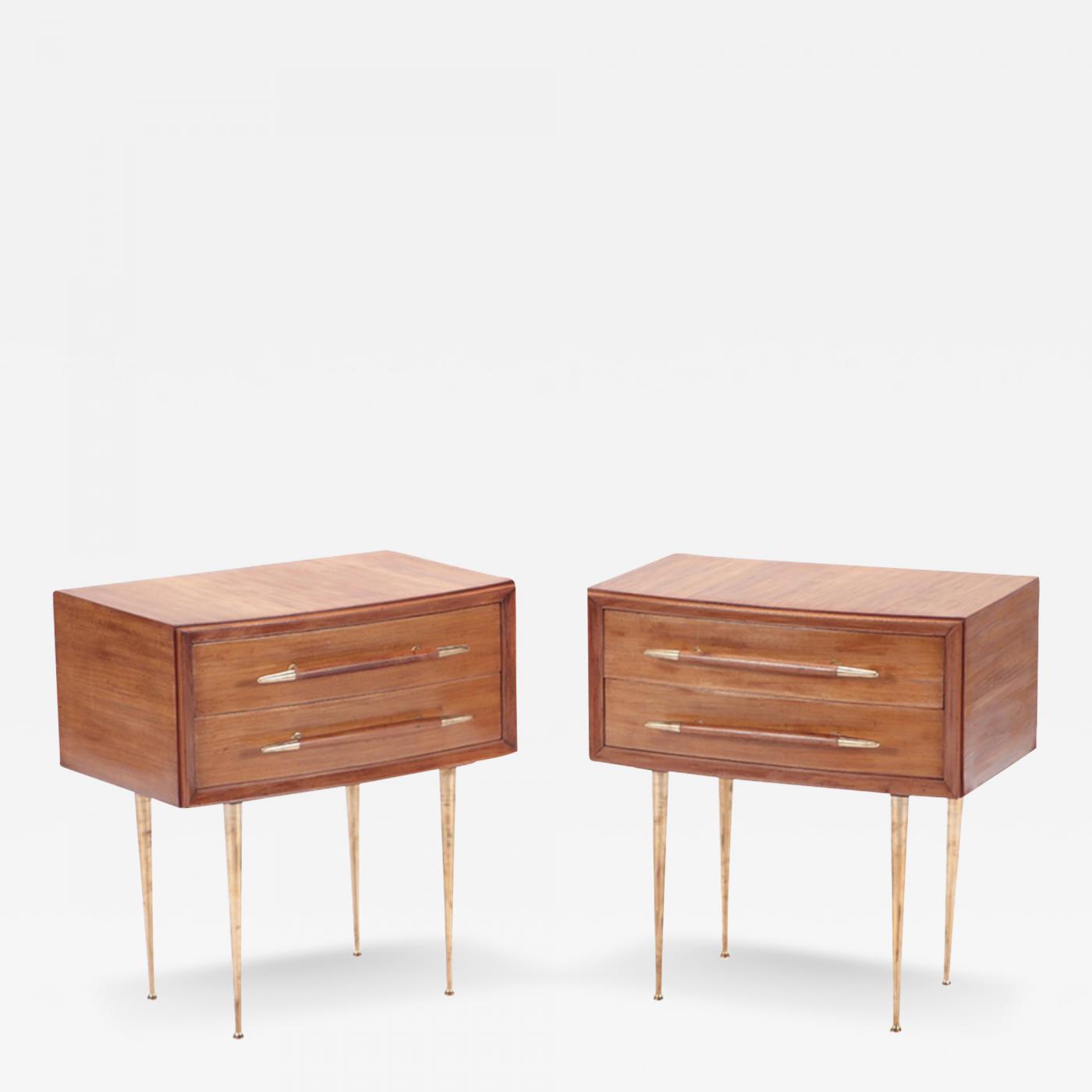 A Pair of Mid Century Modern walnut and brass night stands. Circa 1955