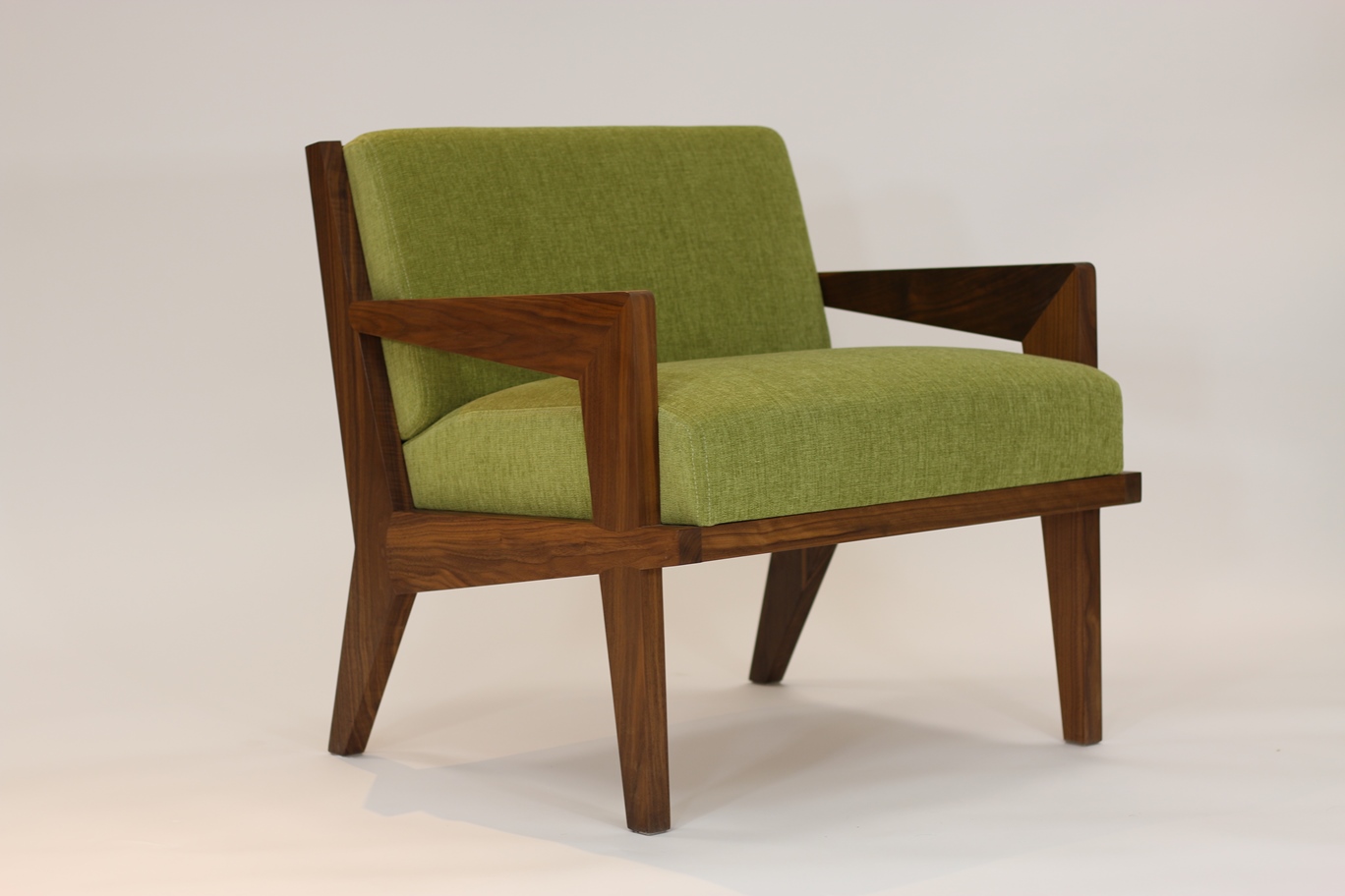 Acorn lounge chair, black walnut. Offered by Visilek Furniture.