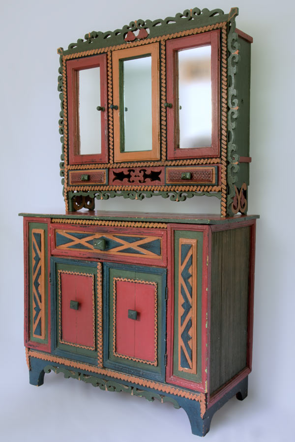 An American folk art paint-decorated cupboard, North Carolina, circa 1920. Offered by Sylvia Antiques.
