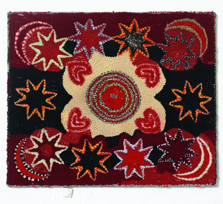 “It has the energy of Van Gogh’s Starry Night,” says the husband, who counts this circa-1900 yarn-sewn rug from southeastern Pennsylvania as one of his favorites.